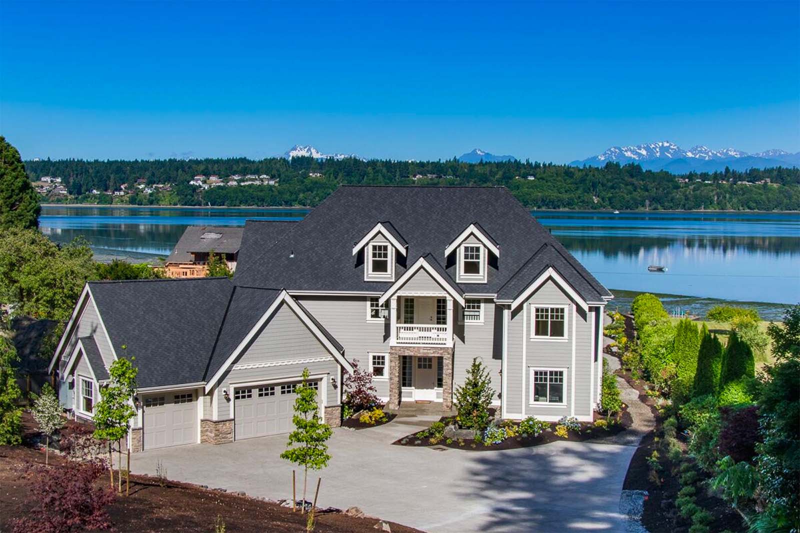 Harbor Custom Home with lake and mountains